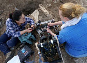 image of Prof. Jean Li and assistant with robot