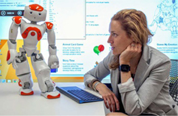 Image of Stephanie Walsh Matthews and robot