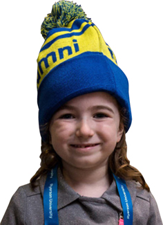 image of young girl with alumni toque